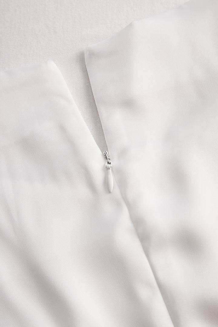 Elegant White Draped Top with Button Detail